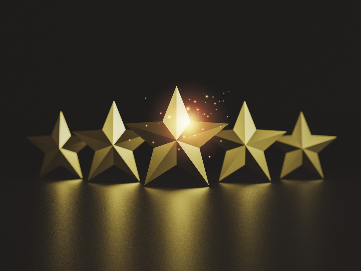 Gold five star on dark background for excellent rate of customer evaluation by 3d render.